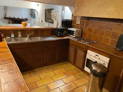 Cuisine ou kitchenette dans l'établissement Magnifique propriété - Piscine - Mer
