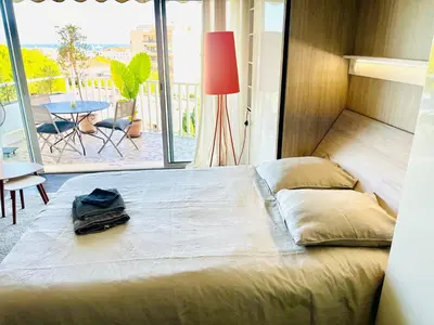 Un ou plusieurs lits dans un hébergement de l'établissement Grande studio, Vue mer magnifique
