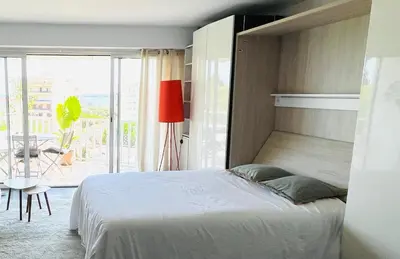 Un ou plusieurs lits dans un hébergement de l'établissement Grande studio, Vue mer magnifique