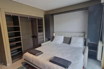 Un ou plusieurs lits dans un hébergement de l'établissement Apartment T2 Golfe Juan PANORAMIC SEA VIEW