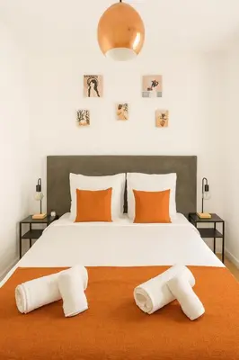 Un ou plusieurs lits dans un hébergement de l'établissement Brise de Sauge 1BR cosy clim, proche Palais