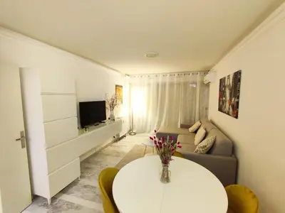 Télévision ou salle de divertissement dans l'établissement Mas de Tanit Appartement & Vacance deLuxe