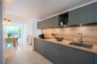 Cuisine ou kitchenette dans l'établissement Charmante Maison dans une belle residence