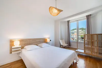 Un ou plusieurs lits dans un hébergement de l'établissement Superb two-bedroom near the Croisette