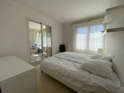Un ou plusieurs lits dans un hébergement de l'établissement Cannes Proche Croisette - Appartement 3 pièces