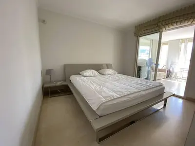 Un ou plusieurs lits dans un hébergement de l'établissement Cannes Proche Croisette - Appartement 3 pièces