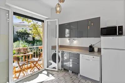 Cuisine ou kitchenette dans l'établissement Le Tivoli - Hypercentre - Calme - Spacieux