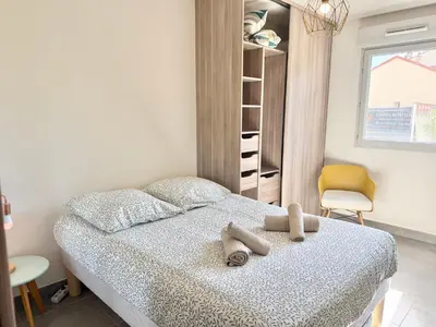 Un ou plusieurs lits dans un hébergement de l'établissement T2 - piscine - garage privé - 5 min de Cannes