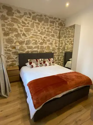 Un ou plusieurs lits dans un hébergement de l'établissement Peaceful City Centre Apartment