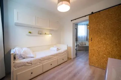 Un ou plusieurs lits dans un hébergement de l'établissement Cote Sable Ambiance bord de mer dans le centre