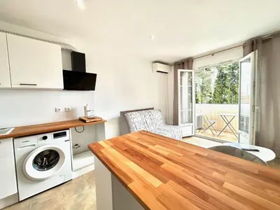 Cuisine ou kitchenette dans l'établissement Studio proche mer