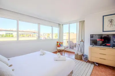 Un ou plusieurs lits dans un hébergement de l'établissement MISTRAL - Appartement 3 chambres, Piscine, Rooftop, Climatisation et Parking
