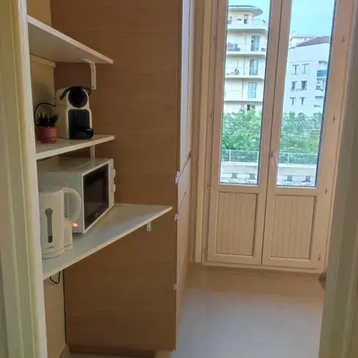 Cuisine ou kitchenette dans l'établissement Studio 25m2, Clim, Parking, proche centre ville et transport