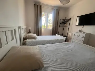 Un ou plusieurs lits dans un hébergement de l'établissement Le paradis d Antibes