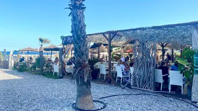 Restaurant ou autre lieu de restauration dans l'établissement SEA VIEW - Rated 5 star - T3 - PEARL BEACH