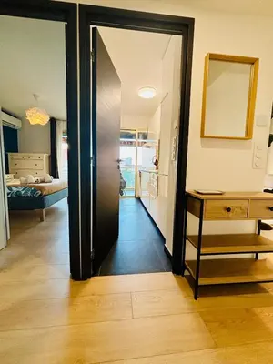 Un ou plusieurs lits dans un hébergement de l'établissement City Center Antibes