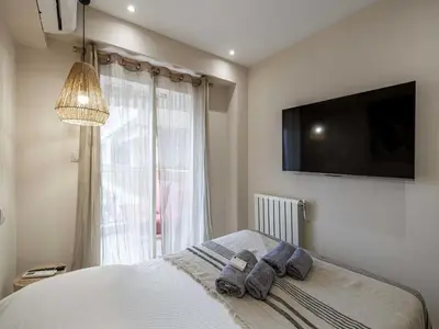 Un ou plusieurs lits dans un hébergement de l'établissement Renovated flat 250m from the beach - Town centre - 2BR 6p