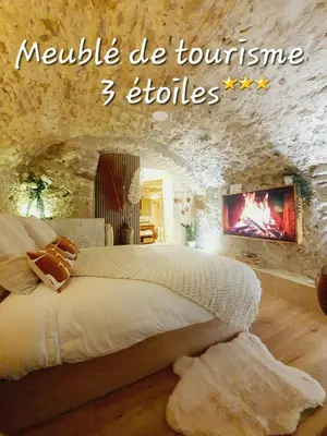 Un ou plusieurs lits dans un hébergement de l'établissement La Bulle, Spa Authentique et Romantique