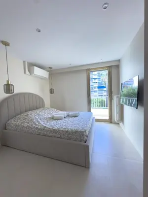 Un ou plusieurs lits dans un hébergement de l'établissement 4-star suite close to Sea , Juan les Pins