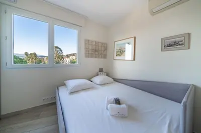 Un ou plusieurs lits dans un hébergement de l'établissement COZYSTAY - Charmant 3 pièces en dernier étage