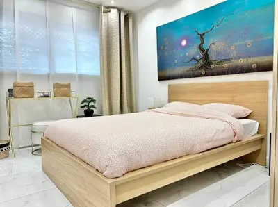 Un ou plusieurs lits dans un hébergement de l'établissement Cannes one bedroom apartment - 20LM1