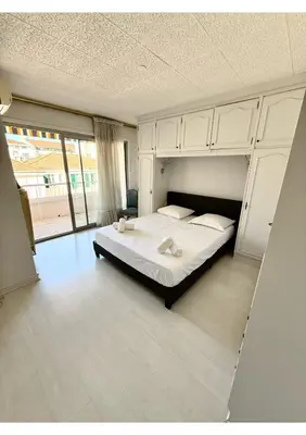 Un ou plusieurs lits dans un hébergement de l'établissement Spacieux T3 avec Terrasse Cannes Centre à Deux Pas de la Croisette
