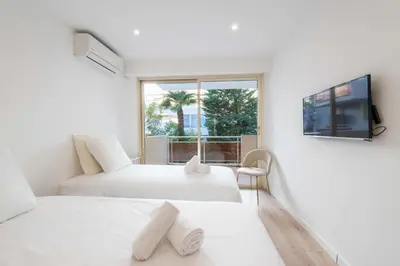 Un ou plusieurs lits dans un hébergement de l'établissement 3-Br Crossing Apartment Palm Beach