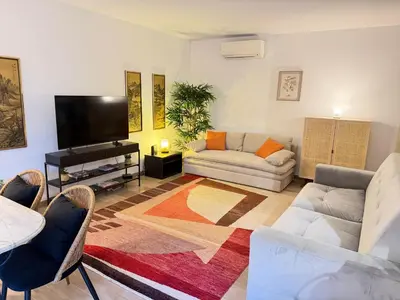 Coin salon dans l'établissement Beautiful 36m2 studio apartment & 50m2 terrace