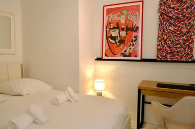 Un ou plusieurs lits dans un hébergement de l'établissement Appartement de standing - quartier Martinez - 70m2