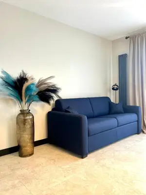Coin salon dans l'établissement Appartement cosy proche de la Croisette