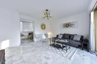 Coin salon dans l'établissement Résidence Cannes Palm Beach, 2 Min Des Plages - Cannes Palm beach, 2 min des plages MAE-1813