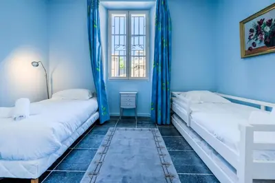 Un ou plusieurs lits dans un hébergement de l'établissement Résidence Rare ! Villa 7p Cap D’antibes, à Pied Des Plages - RARE ! Villa 7P Cap d’Antibes, à pied des plages MAE-1953