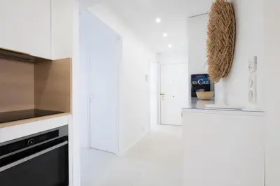 Cuisine ou kitchenette dans l'établissement Résidence 3p De Style à Deux Pas De La Croisette & Commerces - 3P de style à deux pas de la Croisette & commerces MAE-2103