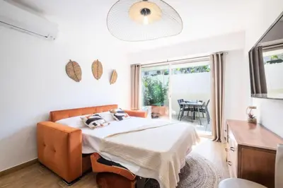 Coin salon dans l'établissement Résidence Appartement Avec Piscine Résidentiel - Appartement avec piscine résidentiel MAE-2183