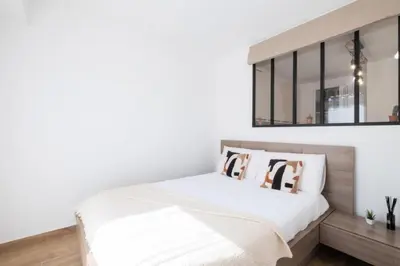 Un ou plusieurs lits dans un hébergement de l'établissement Résidence Appartement Avec Piscine Résidentiel - Appartement avec piscine résidentiel MAE-2183