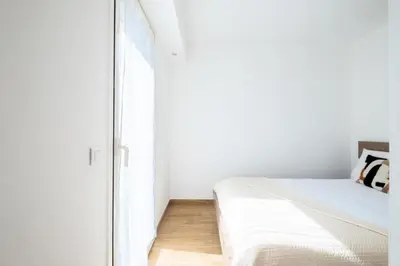 Un ou plusieurs lits dans un hébergement de l'établissement Résidence Appartement Avec Piscine Résidentiel - Appartement avec piscine résidentiel MAE-2183