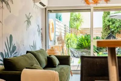 Coin salon dans l'établissement Résidence 2p Cozy Avec Jardin En Plein Coeur Du Palm Beach - 2P cozy avec jardin en plein coeur du Palm Beach MAE-2403