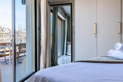 Un ou plusieurs lits dans un hébergement de l'établissement Résidence 3p Rooftop Palm Beach, Plages à 2min à Pied - 3P Rooftop Palm Beach, plages à 2min à pied MAE-2503