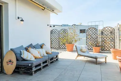 Coin salon dans l'établissement Résidence 3p Rooftop Palm Beach, Plages à 2min à Pied - 3P Rooftop Palm Beach, plages à 2min à pied MAE-2503