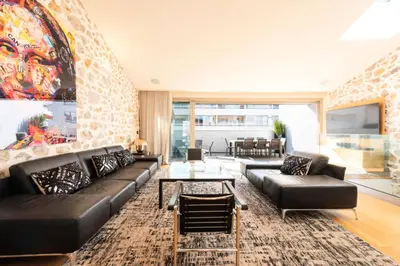 Coin salon dans l'établissement Résidence Duplex 145m² Terrasse Et Ascenseur Privé - DUPLEX 145m² Terrasse et Ascenseur Privé MAE-2873