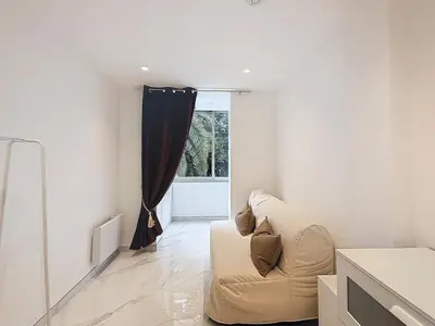 Coin salon dans l'établissement Executive 2BR Apartment near Croisette Ideal for MIPIM Terrace & Wi-Fi