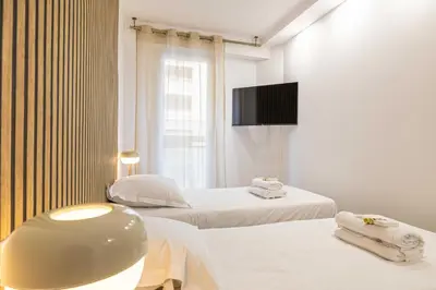 Un ou plusieurs lits dans un hébergement de l'établissement Elegant apt with balcony near the beaches – Cannes