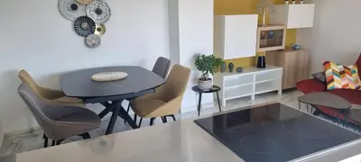 Coin salon dans l'établissement Magnifique deux pièces Lacour
