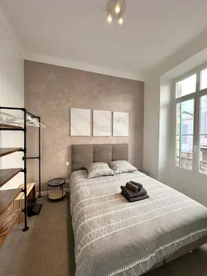 Un ou plusieurs lits dans un hébergement de l'établissement 2 bedrooms, large terrace, city center