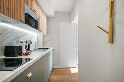 Cuisine ou kitchenette dans l'établissement Vue mer panoramique - Cocon cosy et luxe - Clim et Wifi