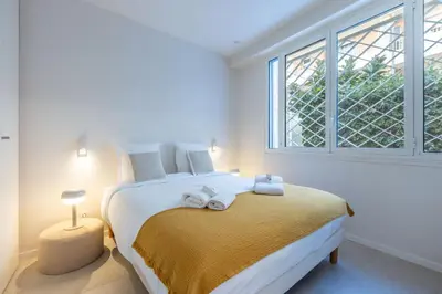 Un ou plusieurs lits dans un hébergement de l'établissement Modern 2 Chambres-TERRASSE-POINTE CROISTTE-PALM BEACH A2B267
