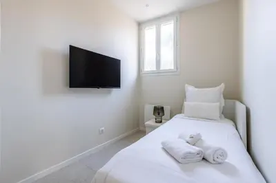 Un ou plusieurs lits dans un hébergement de l'établissement Modern 2 Chambres-TERRASSE-POINTE CROISTTE-PALM BEACH A2B267