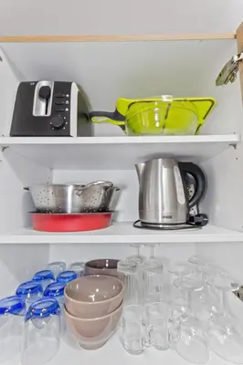 Cuisine ou kitchenette dans l'établissement Le Marina - Cosy - WIFI - Clim - Port