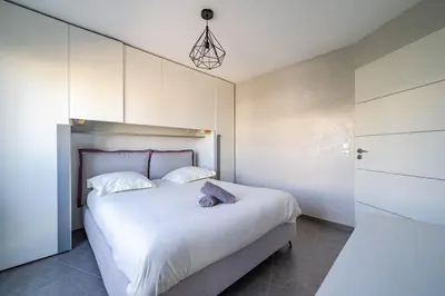 Un ou plusieurs lits dans un hébergement de l'établissement Seaside Escape