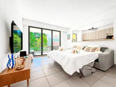 Un ou plusieurs lits dans un hébergement de l'établissement Terranova Cannes Terrace Accommodation